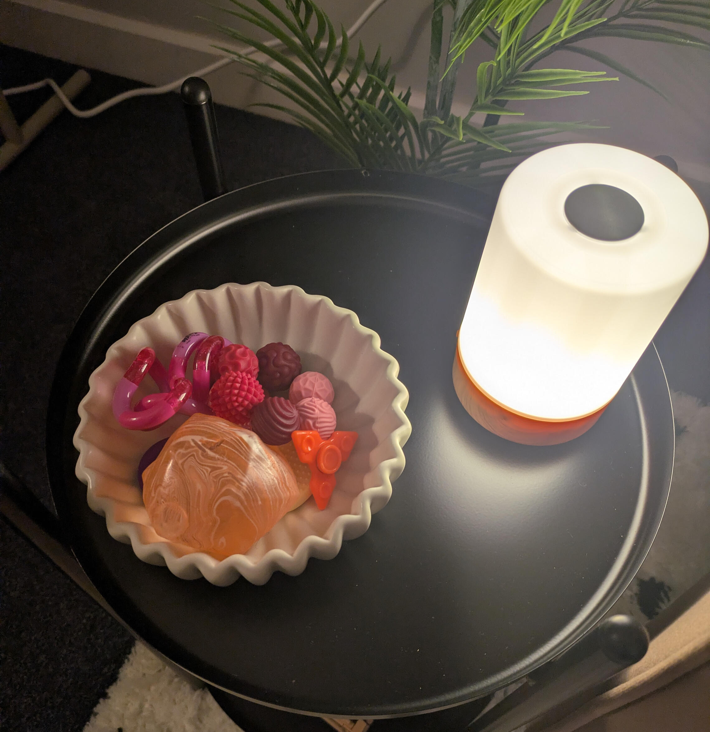 Counselling Room based in Burslem ST6. Image shows two large chairs sat opposite each other with lots of plants and dimmed lighting and candles. Counselling office based in Burslem ST6.
